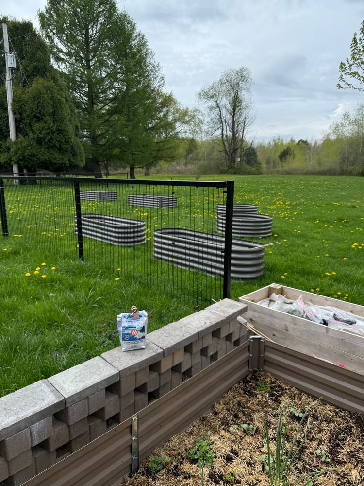 Six new raised beds of varying sizes.