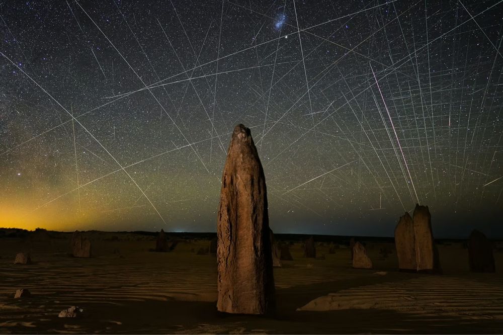 https://www.instagram.com/p/CeA8Y5oLWfb/

"The light pollution caused by satellites is quickly becoming a growing problem for astronomers. In 2021, over 1700 spacecrafts and satellites were put into orbit. Light pollution caused by SpaceX’s Starlink satellites are the worst offenders because they are low Earth orbit satellites, and they travel in satellite trains. One can only assume the issue will exponentially increase in the next few years, with SpaceX alone intending to launch over 40,000 satellites in total. The space industry is almost entirely unregulated, with no limits on the amount of satellites that anyone is able to launch and there is currently no regulation in place to minimise the light pollution they cause."