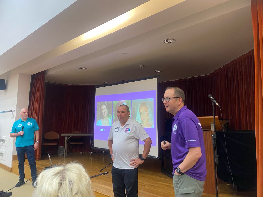 The 3 dads delivering a presentation with images of their 3 daughters on the slide