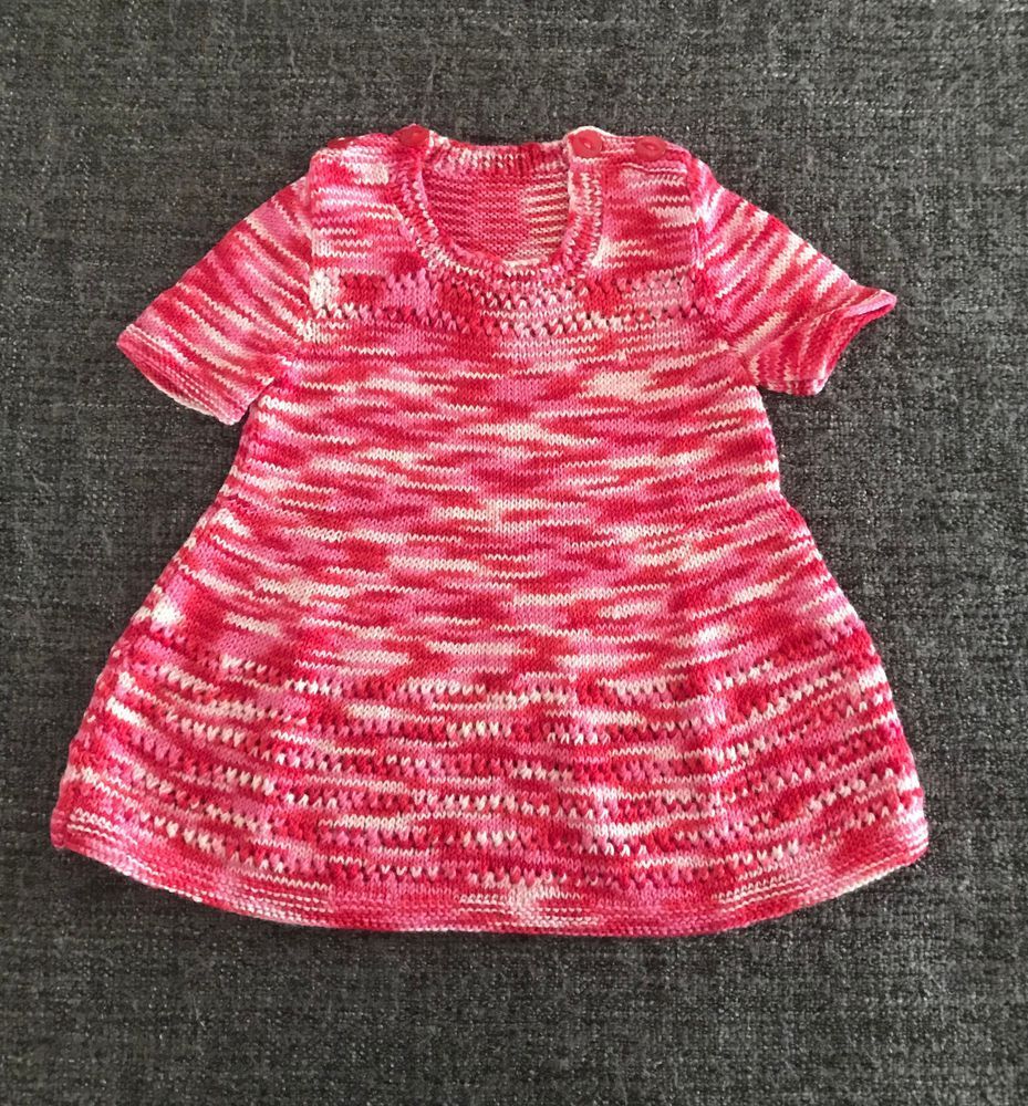 Pink, red and white knitted baby dress