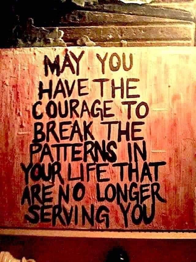 Wall graffiti states, "May you have the courage to break the patterns of life that are no longer serving you". 