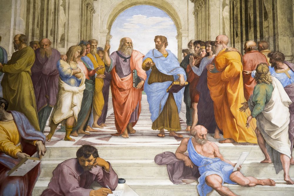 image of a bunch of philosophers. at the center of the image are a pair of men, one in red robes on the left the other in blue robes on the right, who are in discussion with each other