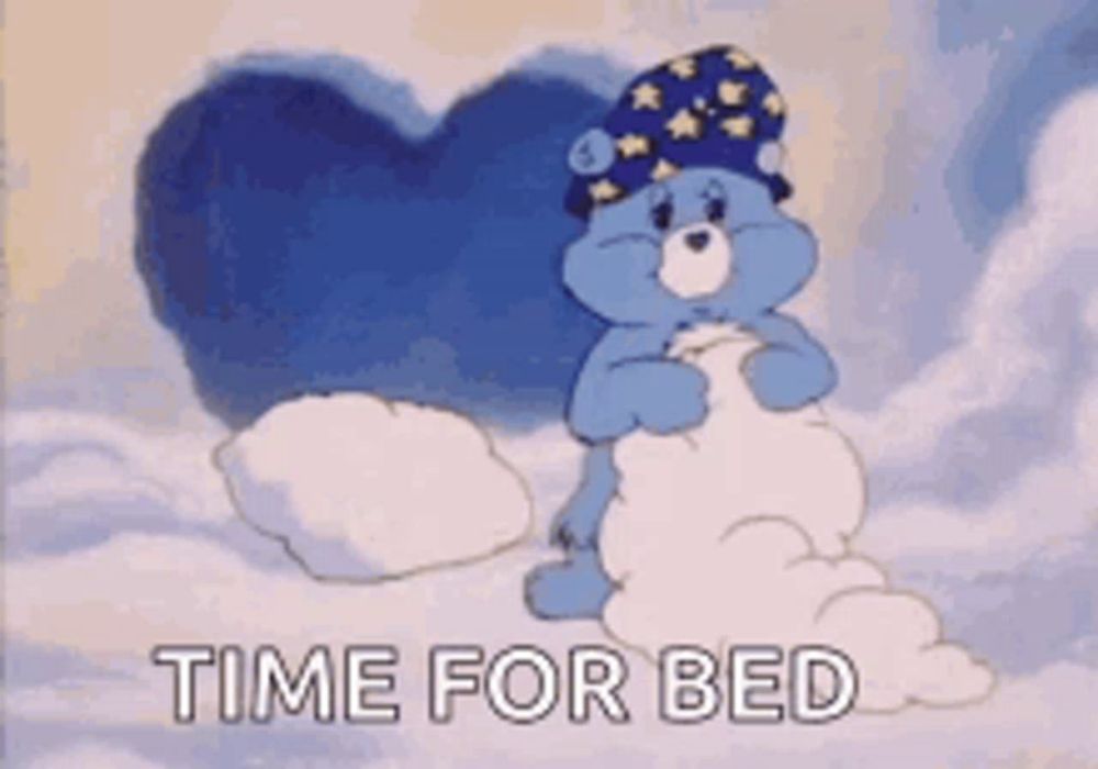 a care bear wearing a sleep cap is holding a pillow in the clouds and says time for bed .