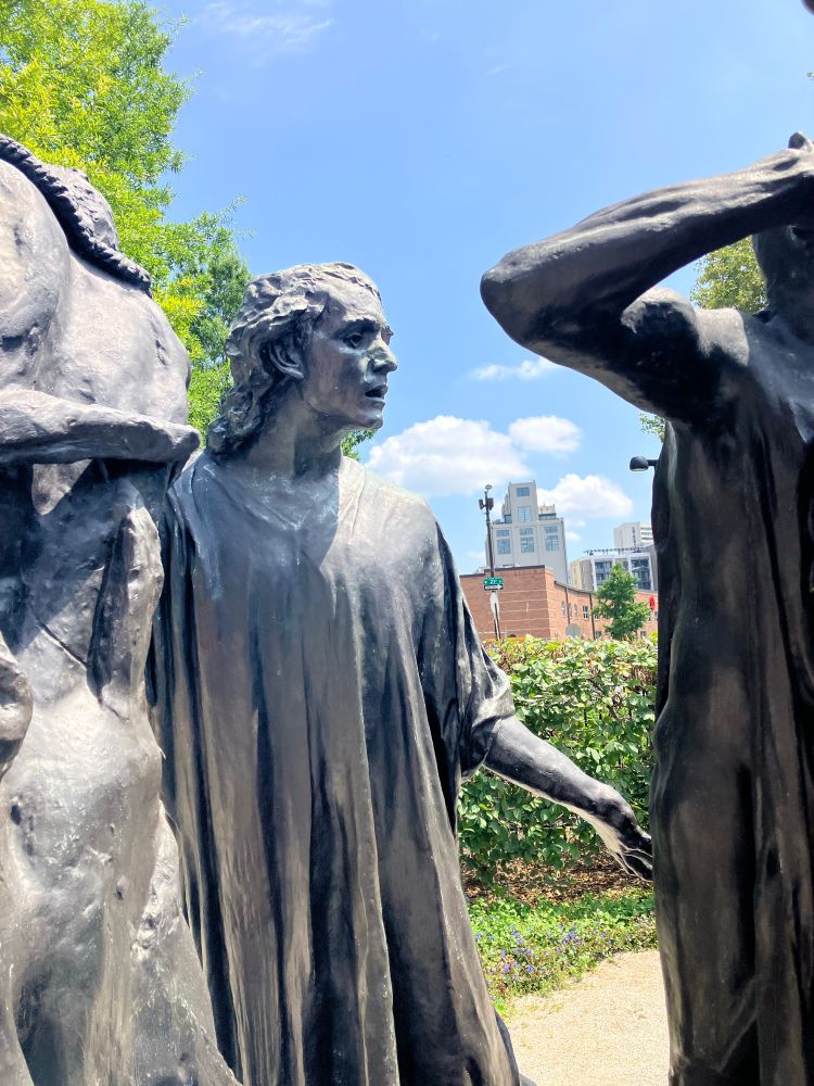 One of The Burghers of Calais by Rodin, a bronze statue of a man