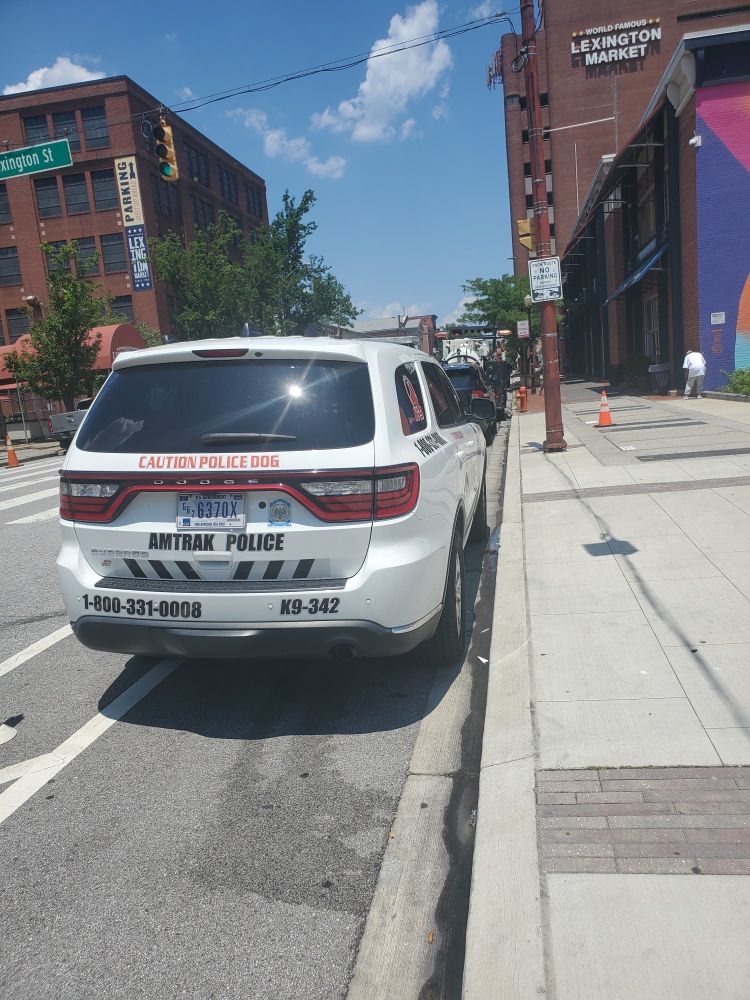 Amtrak police blockingcycle lane to get lunch.