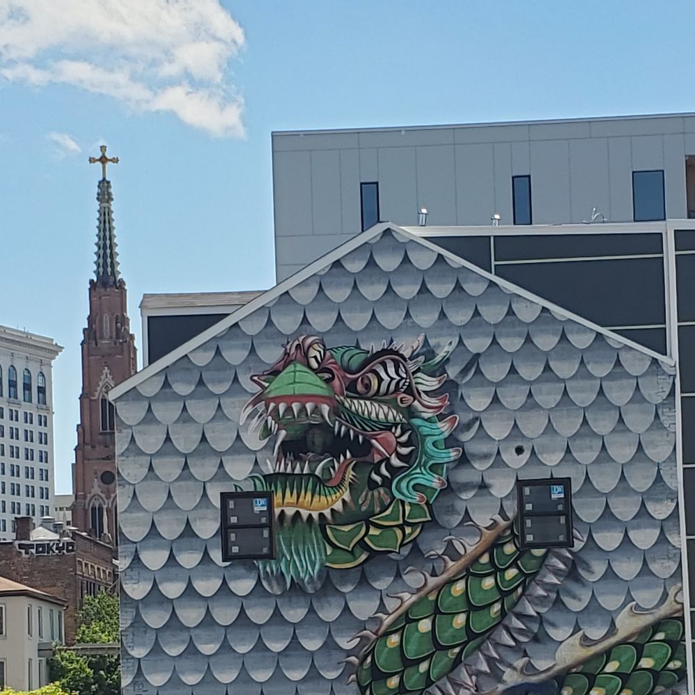 Dragon mural on Baltimore wall.