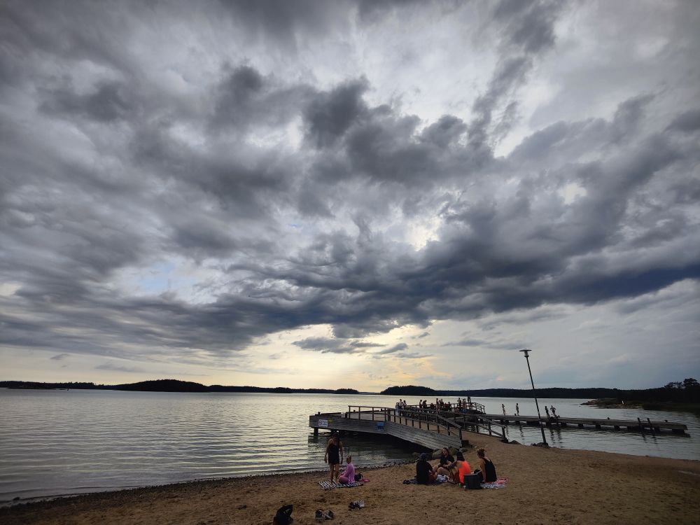 Beach with some menacing clouds above it