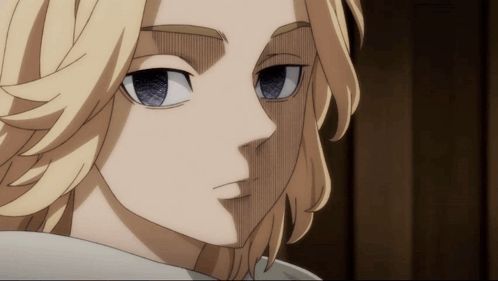 a close up of a blonde anime character 's face with blue eyes