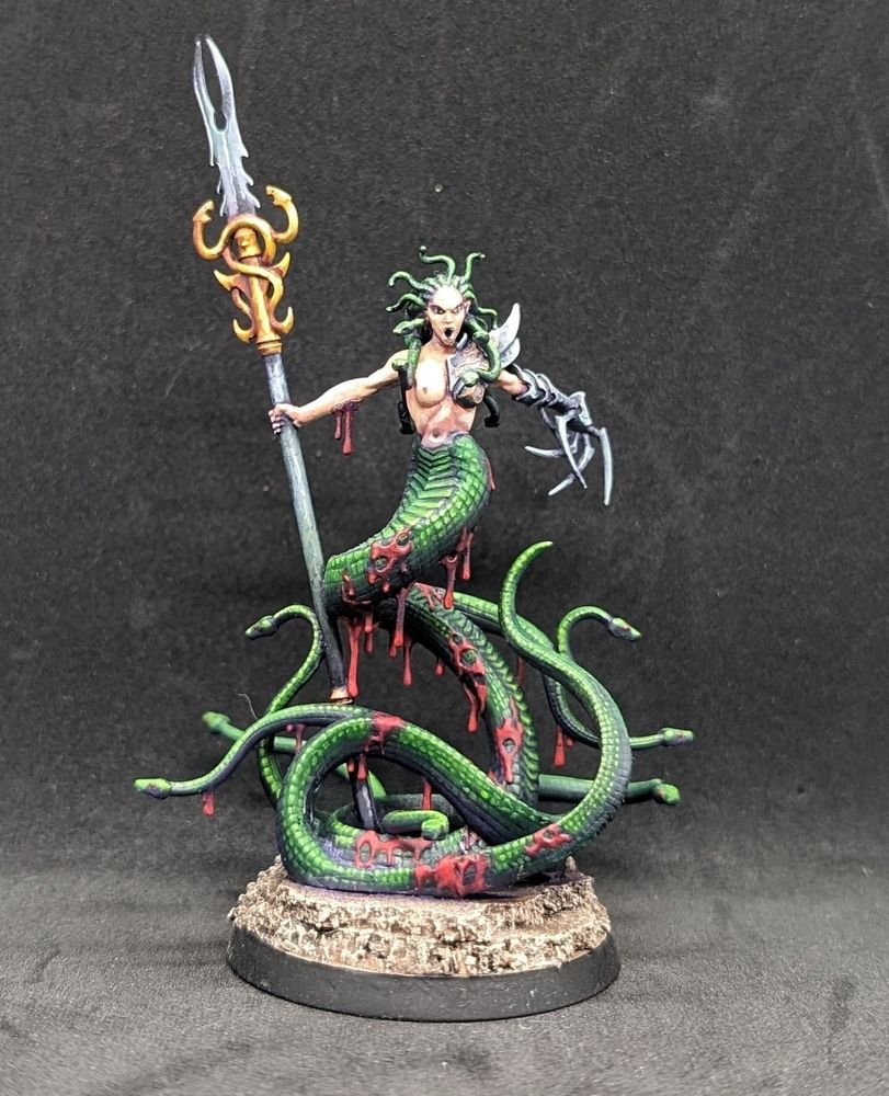 A medusa miniature, by Games Workshop, painted by me. 

