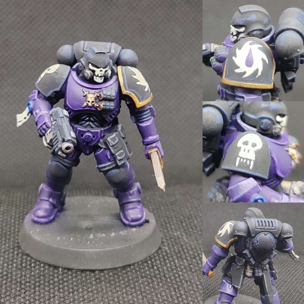 A purple Flesh Tearer Space Marine.
