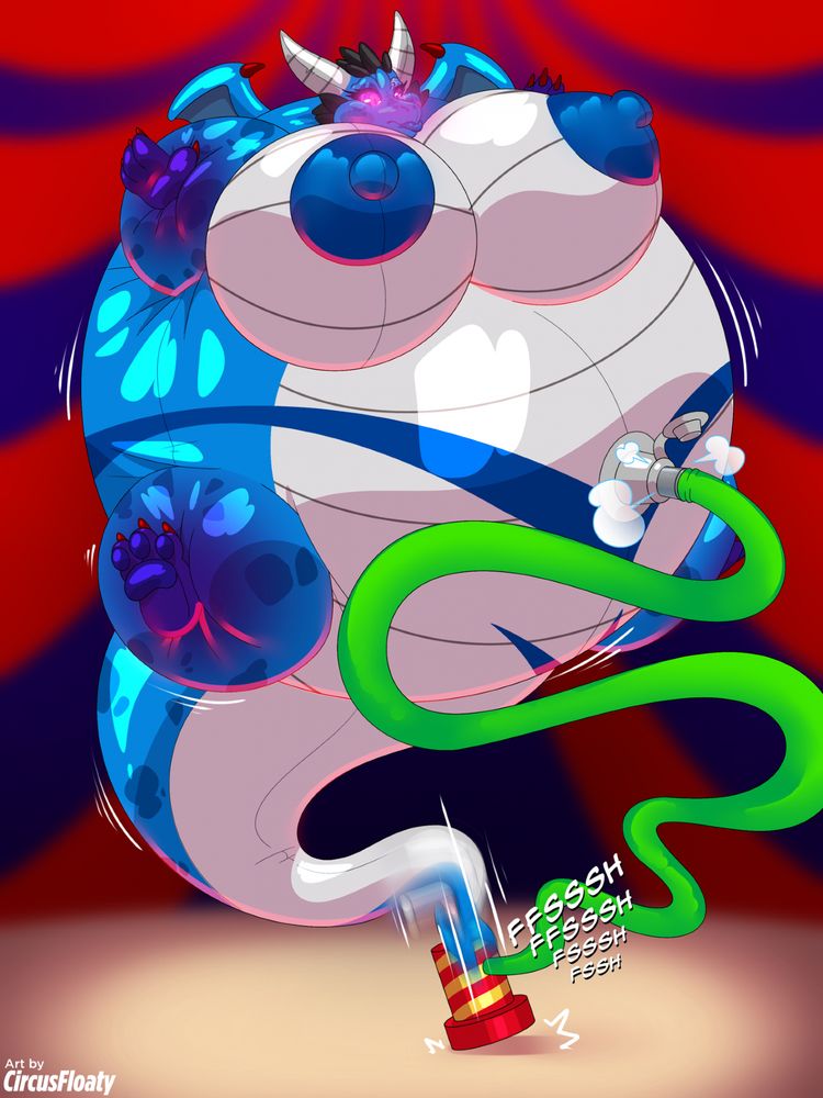 Teneris, now as an inflatable pooltoy in trance, is being filled with air by a tube connected to an air pump, being pumped with the use of her own tail. She has inflated so much that her body has swelled up into being round, even floating from the floor of the circus.