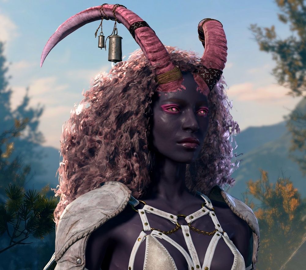 Screen shot of the game Baldur’s Gate 3 depicting a feminine dark purple skinned tiefling with a flowing light pink afro, long pink horns, pink makeup and glowing pink eyes. They are wearing white lingerie and matching white shoulder pads.