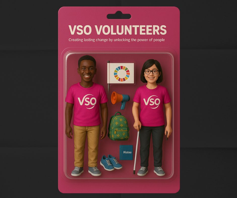 Two action figures of VSO volunteers are in a pink toy box. There is white text which states 'VSO Volunteers - Creating lasting change by unlocking the power of people.'
 
The two figures are wearing pink t-shirts with the VSO logo on them. The male (on the left), has chino-styled pants and grey shoes. The female (on the right) is wearing black pants and grey shoes, while also holding a walking cane.
 
Between the two figures is equipment needed for volunteering activities. This includes a flag with the SDG logo on it, a megaphone, a backpack, and a note book.