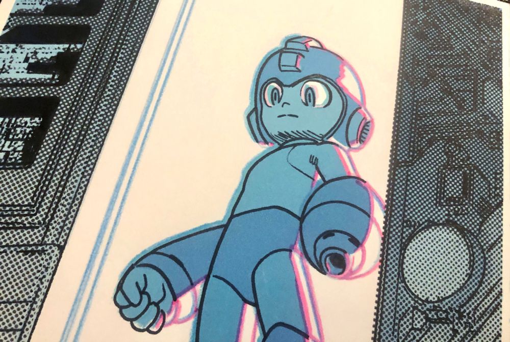 detail of a drawing of the video game character Mega Man by Doc Shaner, who wants you to know he loves these games even though he never beat a single one ever.