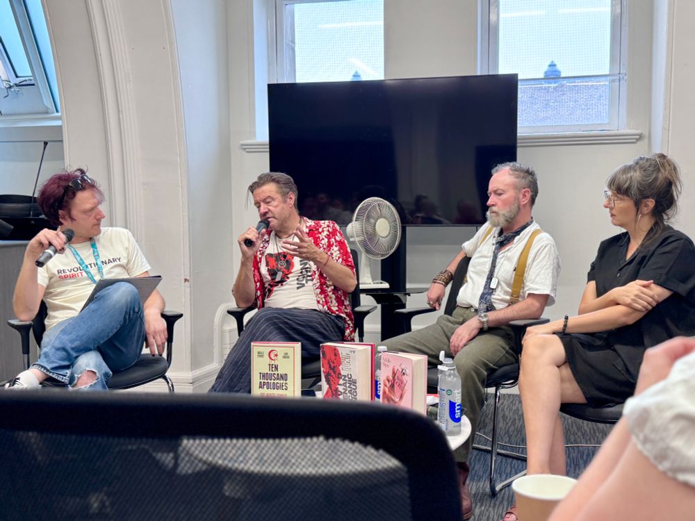 The three strong panel talking to Stu.