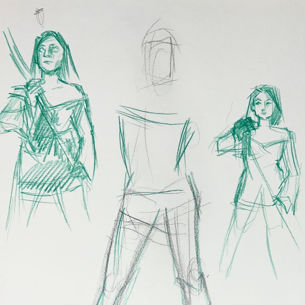 A life drawing of a young woman dressed as a witch. Sketch lines are shades of green and blue in mechanical colored pencil. She’s standing and holding a pole.