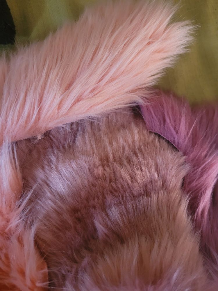 Top left fabric color is "Papaya"
Middle fur color is unknown
Right side color is "Dusty Rose"