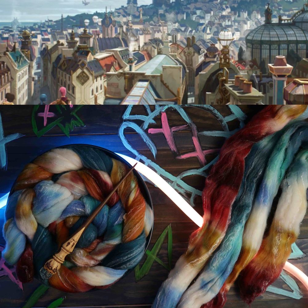Photo of a spinnung fiber braid in colors of blue, rust, teal, and white next to a drawing of the city of Piltover from Arcane