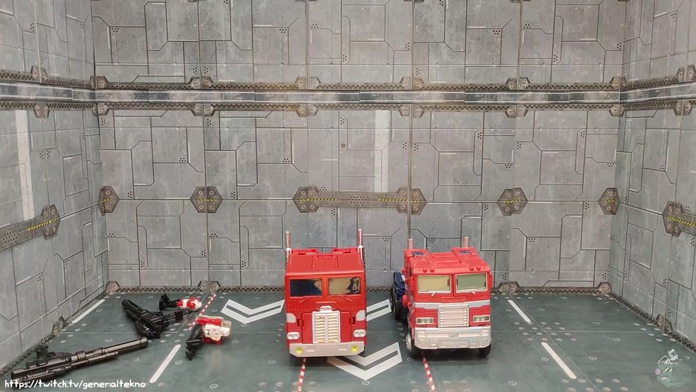 MP Ginrai in altmode next to Earthrise Optimus Prime.

VERY similarly sized cabs.