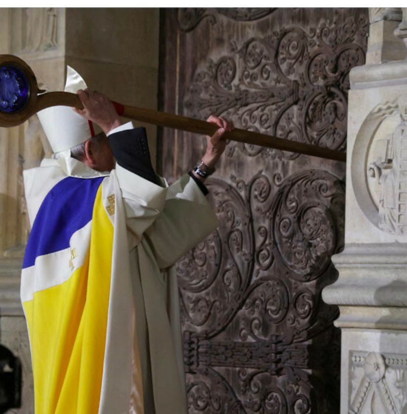 The archbishop of Paris opening the gates of Notre-Dame.