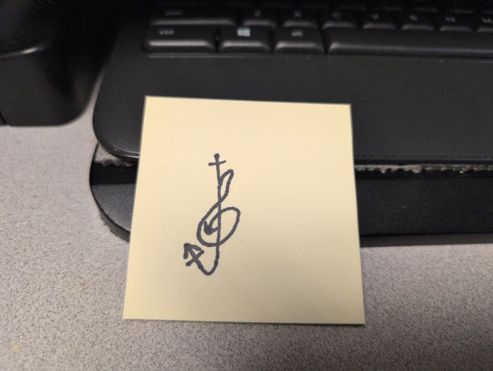 A treble clef integrated with the trans symbol