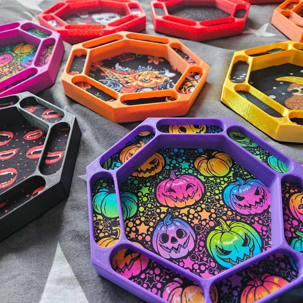 Bold purple orange yellow and red dice trays with colourful linings 