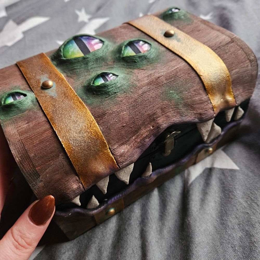 A chest with eyes and teeth protruding out of it (it's a mimic) 