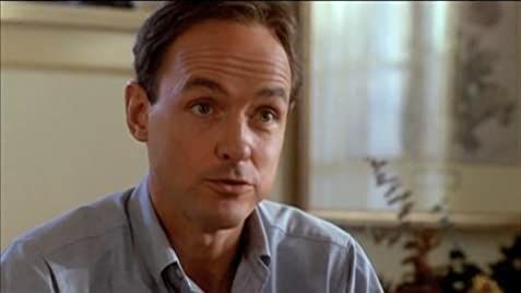 Locke from Lost make up to look young with an absolutely dreadful wig and a spray tan that makes him look like a completely different person.