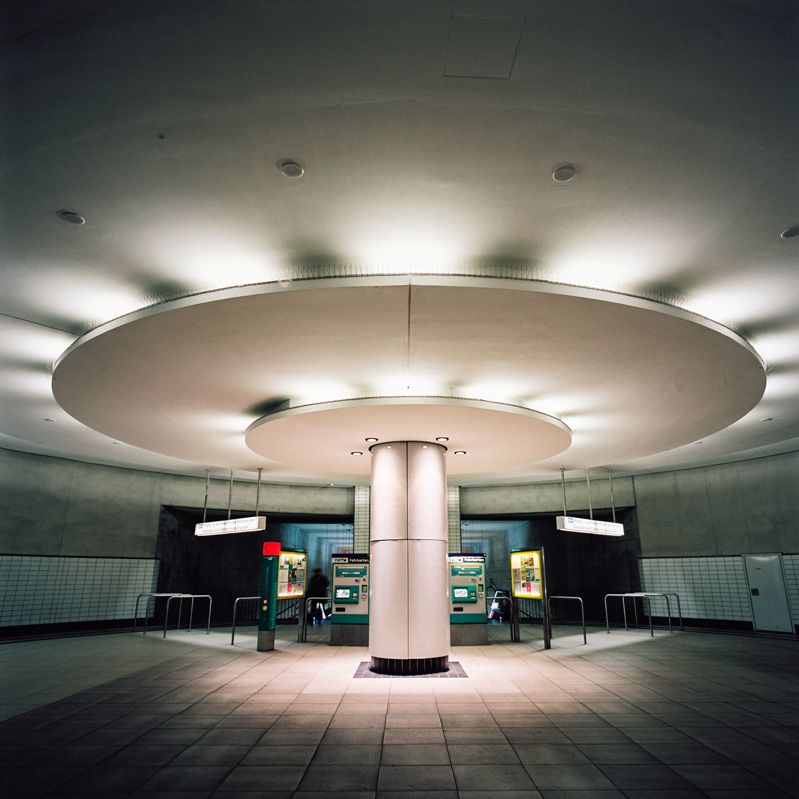 This is a wide angle color image of subway station "Bockenheimer Warte" in Frankfurt, Germany. 