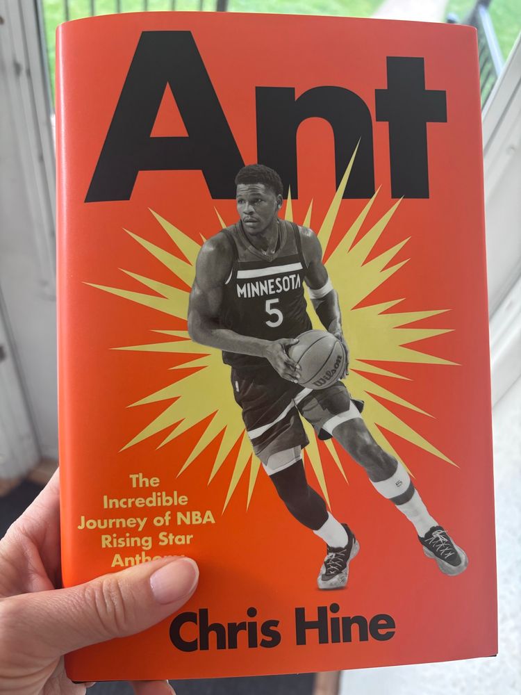 Chris Hine’s book about Anthony Edwards entitled ANT. Orange cover, bright yellow explosion behind a black and white full body picture of Anthony Edwards.
