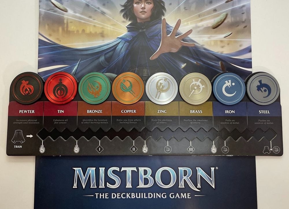 Custom-designed 3d printed allomancy tokens on a player tracker board from Mistborn: the Deckbuilding Game.
