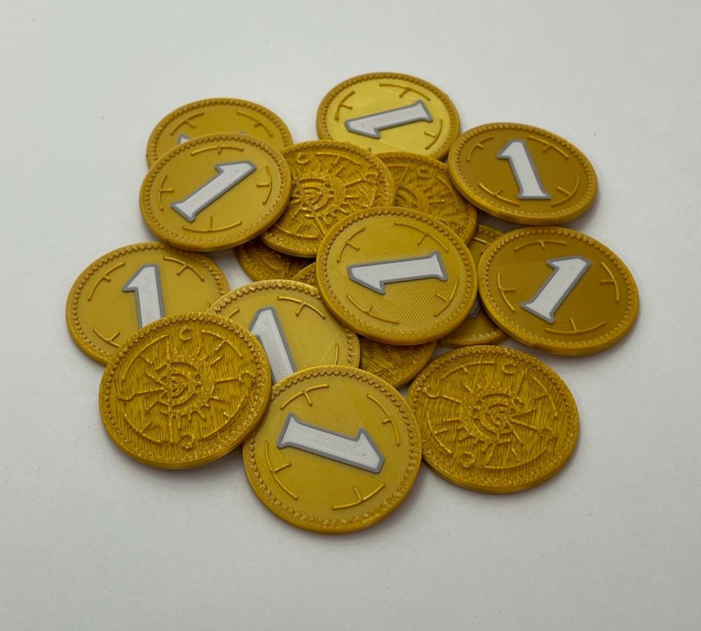 A pile of shiny gold 3d-printed "Boxings", the currency used in Mistborn.