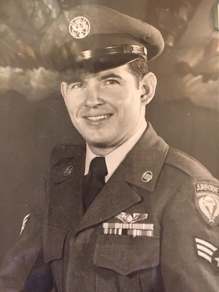 A picture of a handsome fella smiling in his US Army Aircorp uniform. 