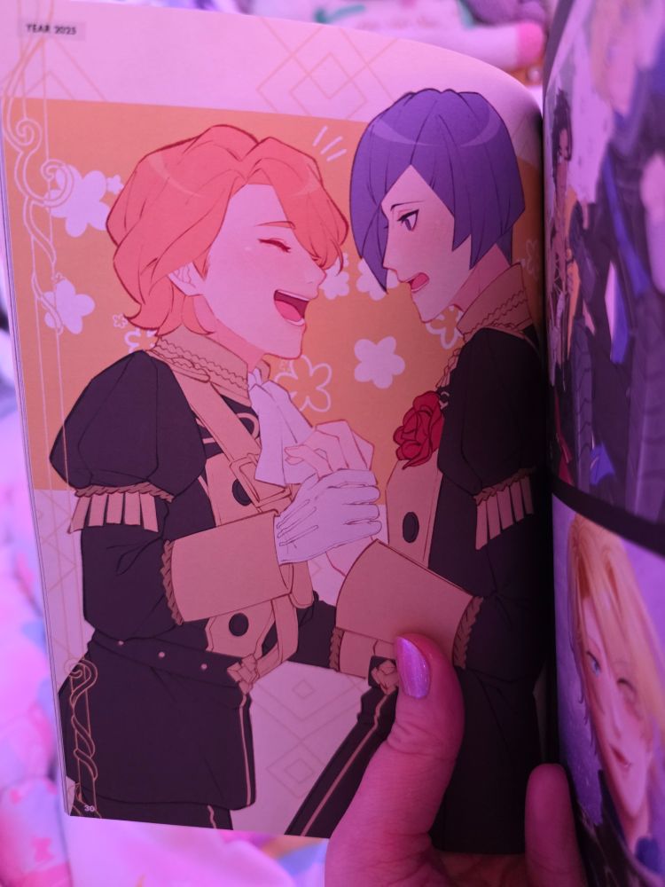 A page in the artbook featuring FerdiRenz art of academy Ferdinand smiling and grabbing Lorenz's hand