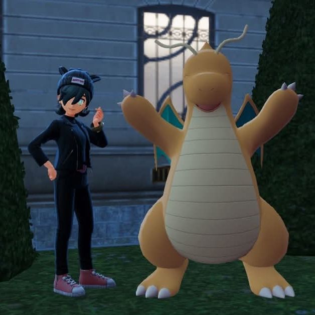 Pokemon avatar snapping fingers next to a cheering Dragonite