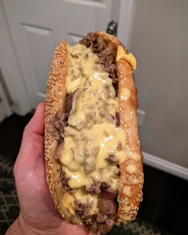 Homemade Philly Cheesesteak on a hoagie roll I made from scratch.