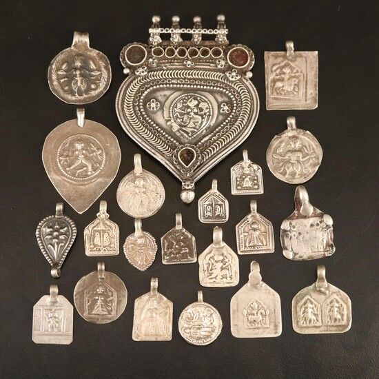 Another collection of silver amulets