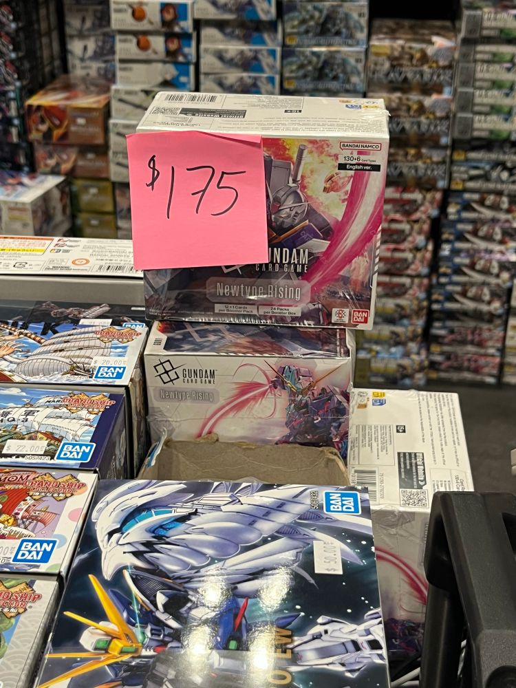 Gundam Card Game booster boxes being sold at $175 each. MSRP is $120