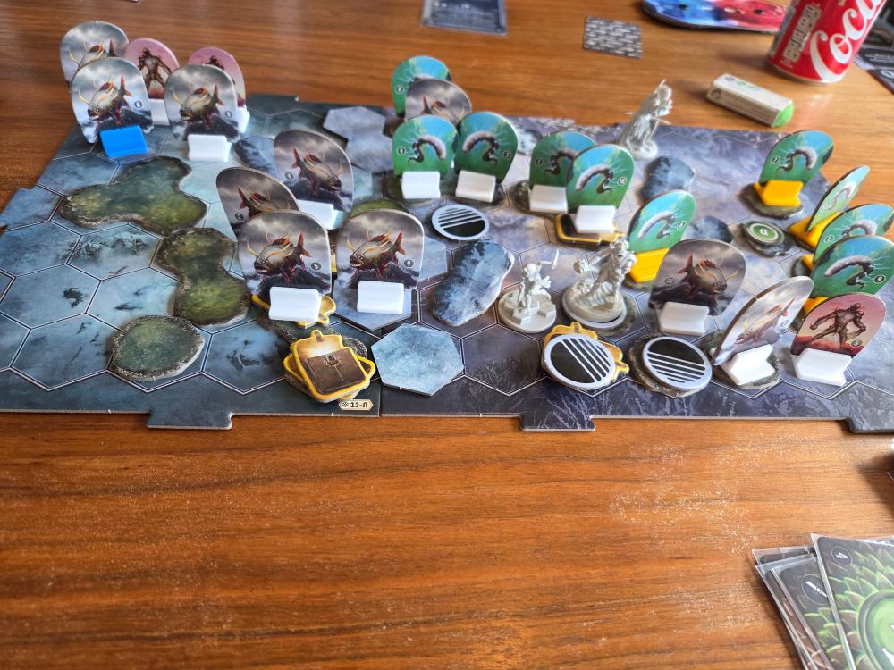 A photograph of the board gsme Frosthaven. All enemies that possibly can spawn, have spawned.