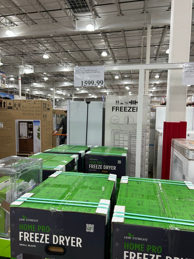Picture of a Costco display of “Home Pro Freeze Dryers” for the price of $1599.99. 
