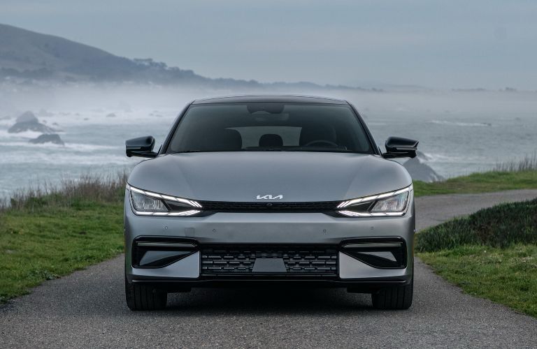 Front fascia of the Kia EV6 showing a pinched roof and front bumper compared to the main body of the car.