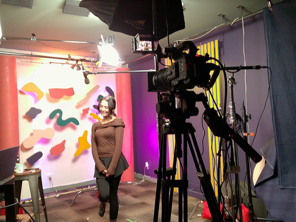 Host Niba does a curtsy on the SciShow set!