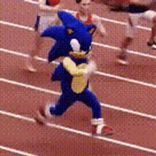 A runner on a running track wearing a Sonic the hedgehog costume passing other competitors.
