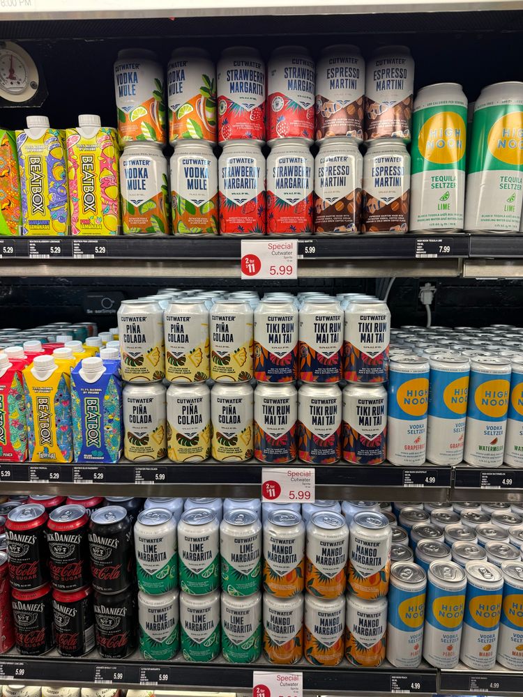 A whole wall of Cutwater cocktails aka “a concussion in a can”