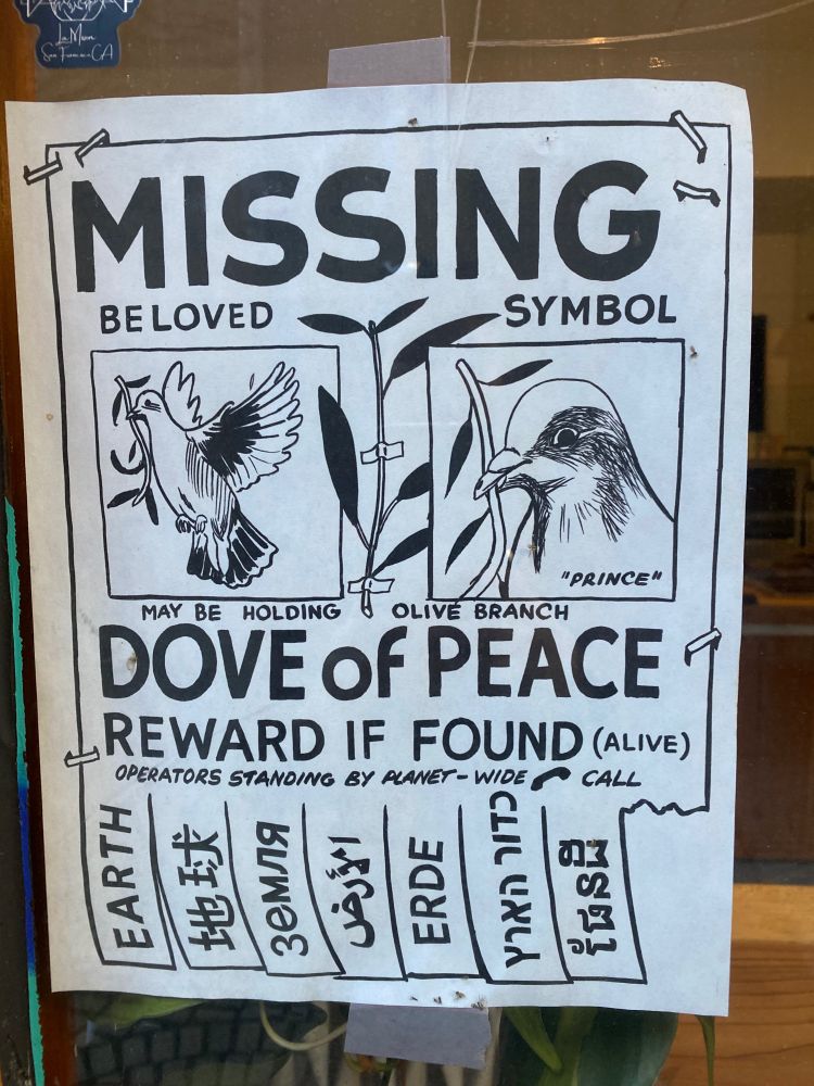 Flyer: missing beloved symbol dove of peace reward if found the earth in several languages 