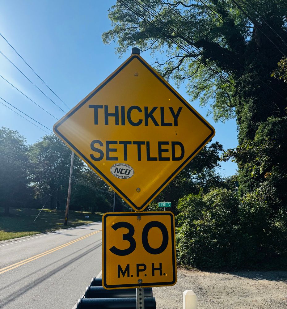 A road sign reading “THICKLY SETTLED”

(Underneath, irrelevant, is a speed limit of 30)