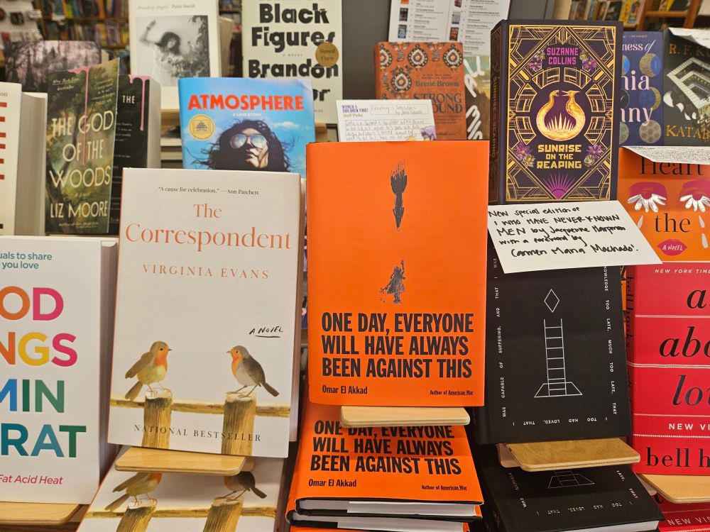 A table full of books on display.