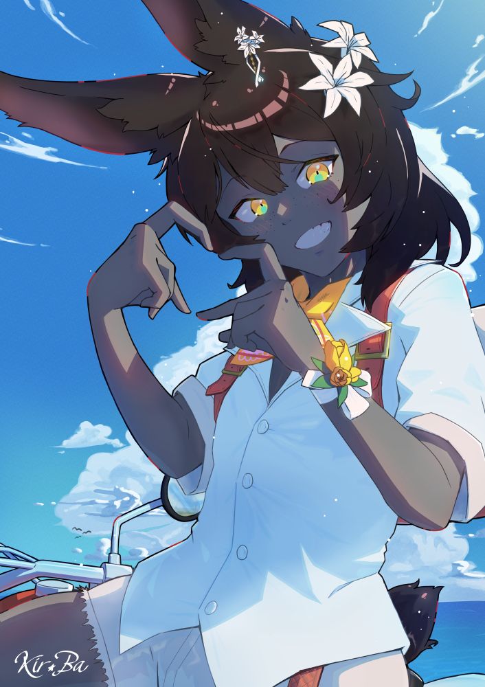 On a summers blue sky day, a grey skinned, dark bunny is sitting on a motorbike.
He is hand gesturing a heart as he stares at the camera.