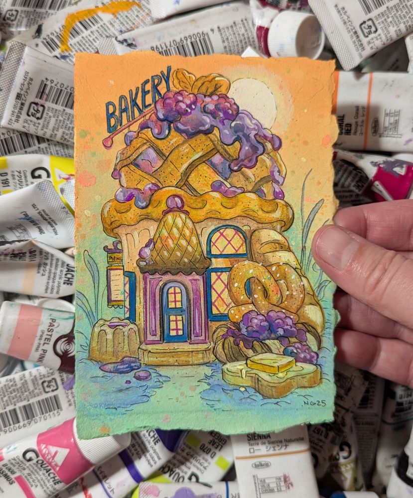 Mini painting of bakery with lattice pie roof and pile of baked goodies.