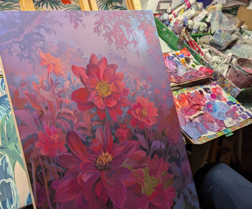 Wip of flowers on easel with paint pallet